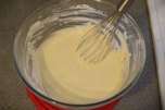 Flour whisked in to eggs and sugar